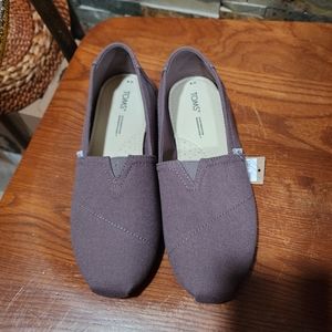 TOMS gray canvas slip on shoes. New with tags., never worn.